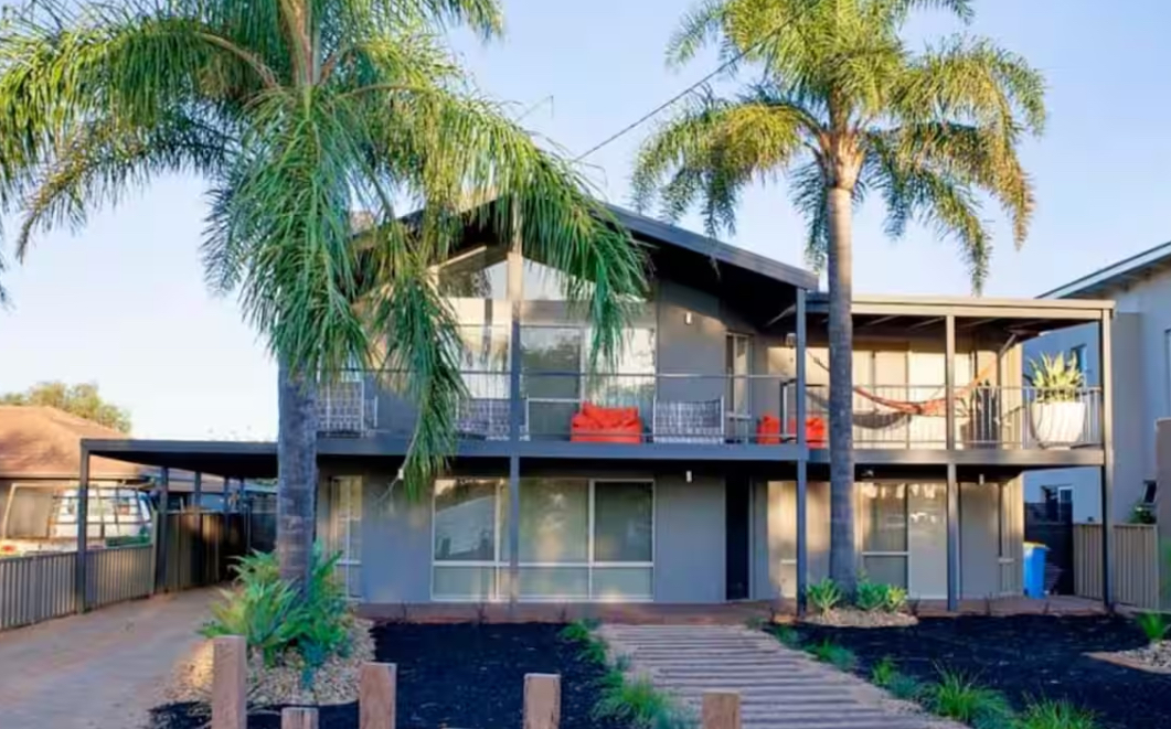 Paradise Waters exterior with palm trees