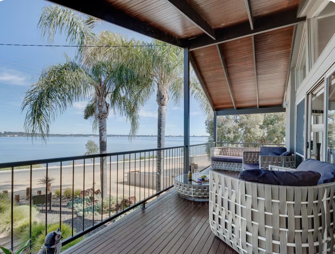 Paradise Waters balcony lounge with Lake Mulwala views
